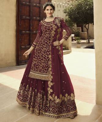 Soft premium net wedding wear sharara in dusty maroon color with embroidery work 1