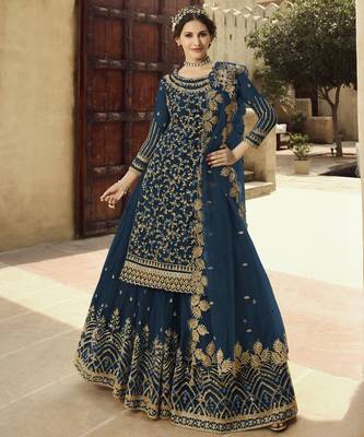 Soft premium net wedding wear sharara in teal blue color with embroidery work 1