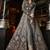 Soft premium net wedding wear gown in grey color with embroidery work