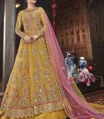yellow net embroidered wedding anarkali gown