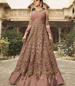 Soft premium net wedding wear gown in pink color with embroidery work