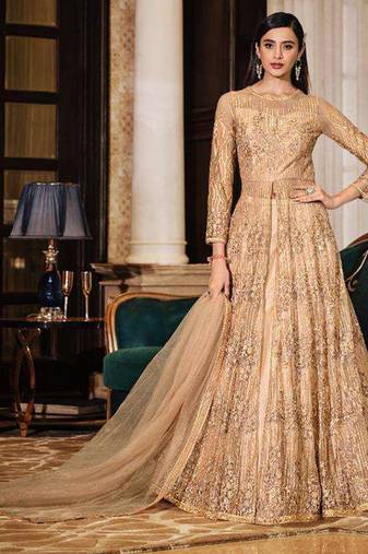 Soft premium net wedding wear gown in golden color with embroidery work