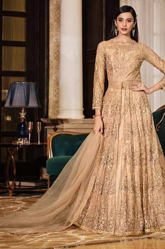 golden wedding wear soft net semi stitched gown	