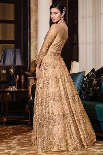 golden wedding wear soft net semi stitched gown	