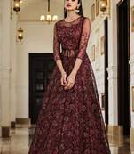 Soft premium net wedding wear gown in maroon color with embroidery work