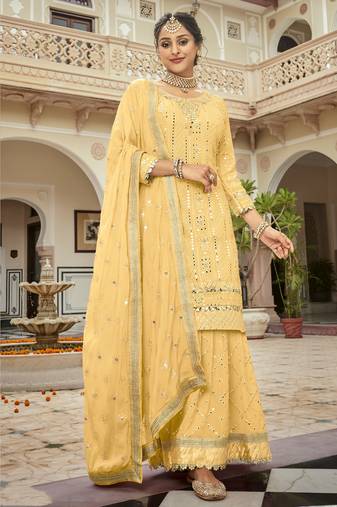 yellow pure georgette suit with embroidery