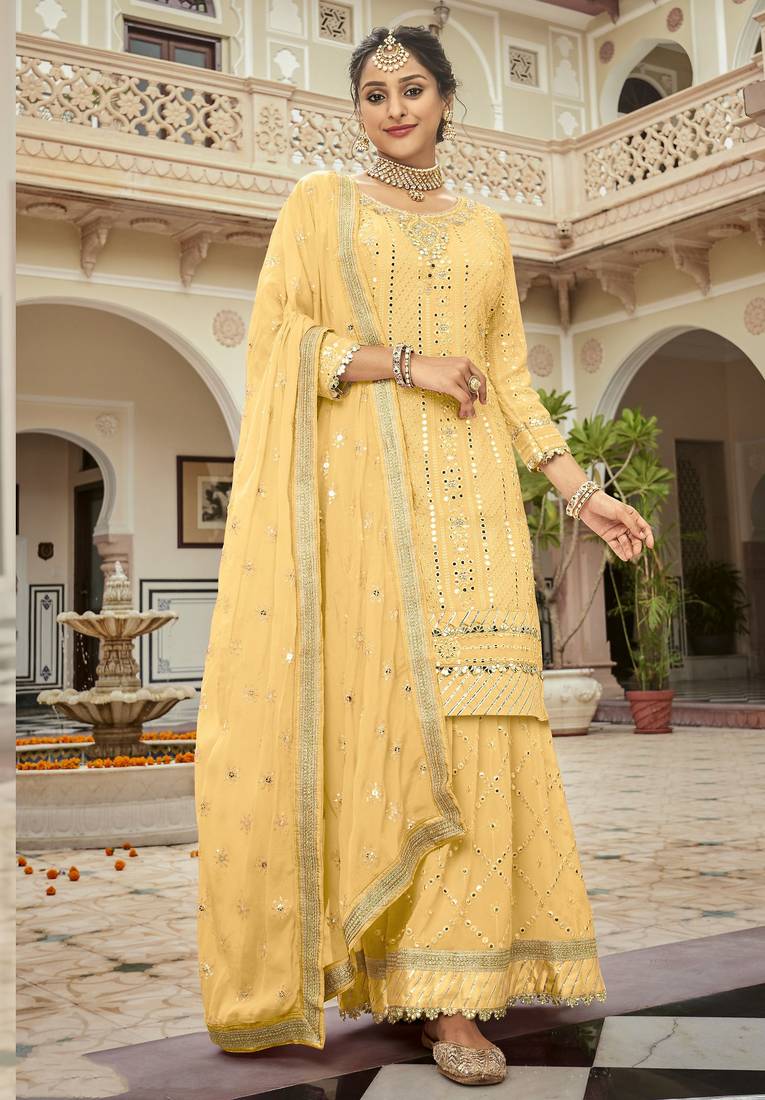yellow pure georgette suit with embroidery