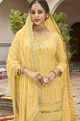 yellow pure georgette suit with embroidery