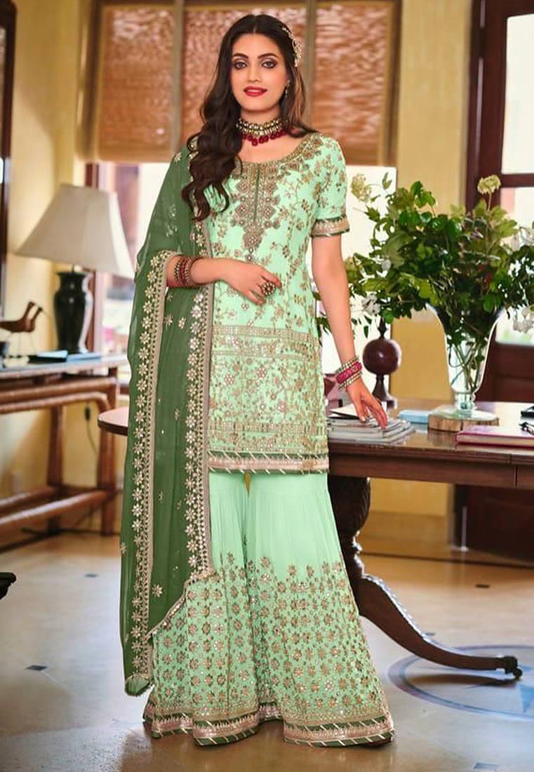 Pure georgette party wear sharara in light green color with embroidery work