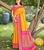 graceful yellow banarasi silk blend saree with golden zari woven border & floral jaal     wedding & festive wear