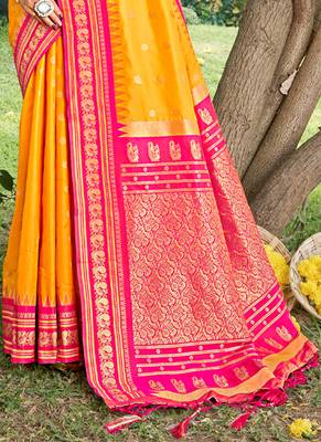 yellow banarasi silk blend saree with golden zari woven border 3