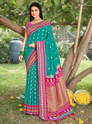 sea green banarasi silk blend saree with golden zari woven border 1