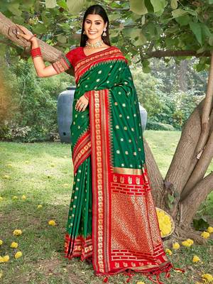 green banarasi silk blend saree with golden zari woven border 1