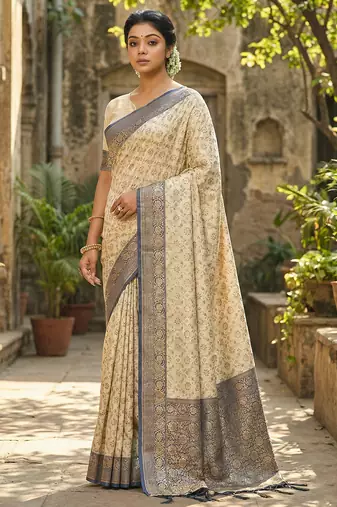 Ivory and navy blue banarasi silk saree with golden zari     regal elegance for timeless celebrations