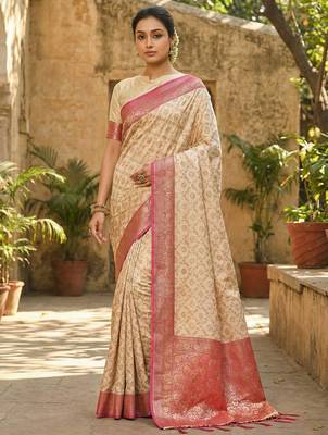 Ivory and pink banarasi silk blend saree with golden zari   1