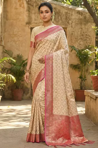 Ivory and pink banarasi silk saree with golden zari – regal elegance for timeless celebrations