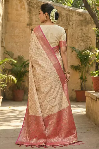 Ivory and pink banarasi silk blend saree with golden zari  