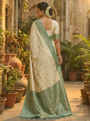 Ivory and sea green banarasi silk blend saree with golden zari   2