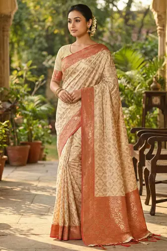 Ivory and red banarasi silk saree with golden zari     regal elegance for timeless celebrations
