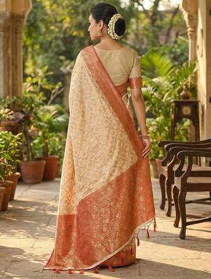 Ivory and red banarasi silk blend saree with golden zari   2