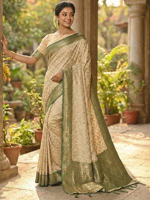 Ivory and green banarasi silk blend saree with golden zari   1