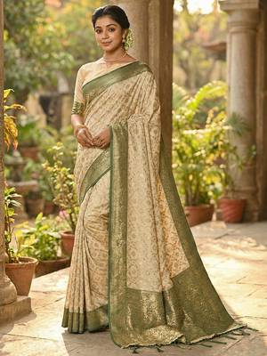 Ivory and green banarasi silk blend saree with golden zari   2