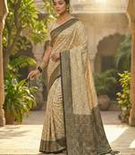 Ivory and black banarasi silk saree with golden zari – regal elegance for timeless celebrations
