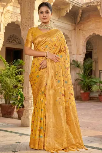 Graceful yellow banarasi silk saree with golden zari woven border & floral jaal     wedding & festive wear