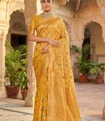 Graceful yellow banarasi silk saree with golden zari woven border & floral jaal     wedding & festive wear