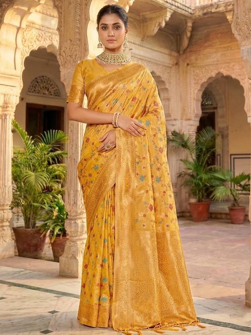 Graceful yellow banarasi silk saree with golden zari woven border & floral jaal     wedding & festive wear