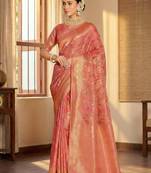 Graceful peach banarasi silk saree with golden zari woven border & floral jaal     wedding & festive wear