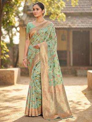 sea green banarasi silk blend saree with golden zari woven border 1
