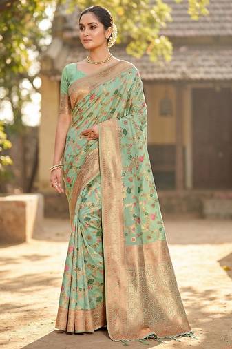 Graceful sea green banarasi silk saree with golden zari woven border & floral jaal     wedding & festive wear