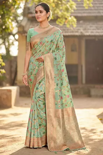 Graceful sea green banarasi silk saree with golden zari woven border & floral jaal     wedding & festive wear