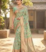 Graceful sea green banarasi silk saree with golden zari woven border & floral jaal     wedding & festive wear