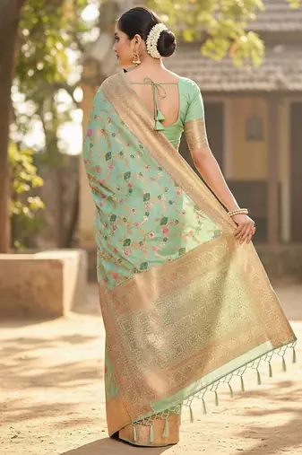 sea green banarasi silk blend saree with golden zari woven border