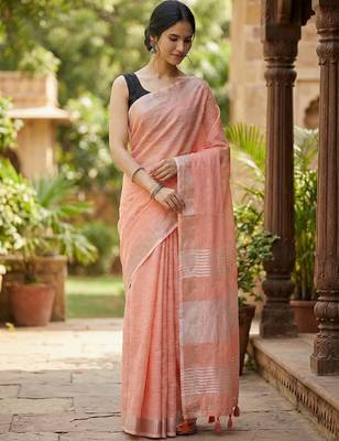 Elegant peach woven linen saree with contrast zari border & tassels  soft & breathable party wear 2