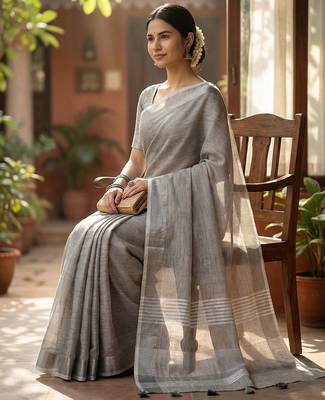Elegant grey woven linen saree with contrast zari border & tassels  soft & breathable party wear 2