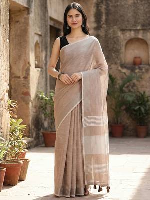 Elegant brown woven linen saree with contrast zari border & tassels  soft & breathable party wear 1