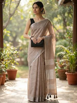 Elegant brown woven linen saree with contrast zari border & tassels  soft & breathable party wear 2