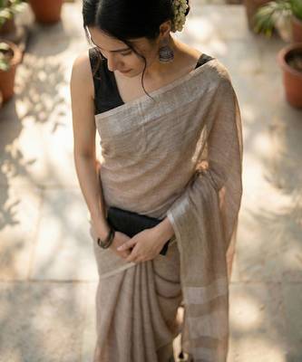 Elegant brown woven linen saree with contrast zari border & tassels  soft & breathable party wear 3