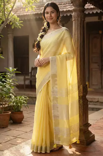 Elegant yellow woven linen saree with contrast zari border & tassels     soft & breathable party wear