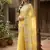 Elegant yellow woven linen saree with contrast zari border & tassels     soft & breathable party wear