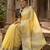 Elegant yellow woven linen saree with contrast zari border & tassels     soft & breathable party wear