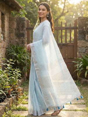 Elegant sky blue woven linen saree with contrast zari border & tassels  soft & breathable party wear 2