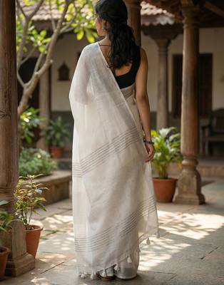 Elegant white woven linen saree with contrast zari border & tassels  soft & breathable party wear 2