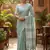 Elegant sea green woven linen saree with contrast zari border & tassels   soft & breathable party wear