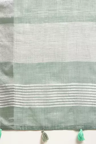 Elegant sea green woven linen saree with contrast zari border & tassels  soft & breathable party wear