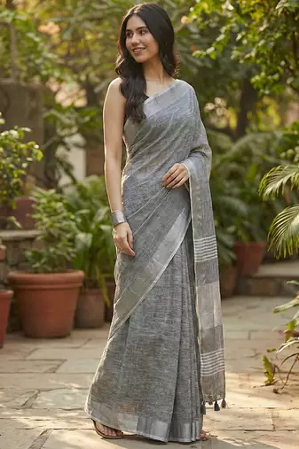 Elegant dark grey woven linen saree with contrast zari border & tassels  soft & breathable party wear