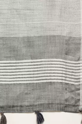 Elegant dark grey woven linen saree with contrast zari border & tassels  soft & breathable party wear